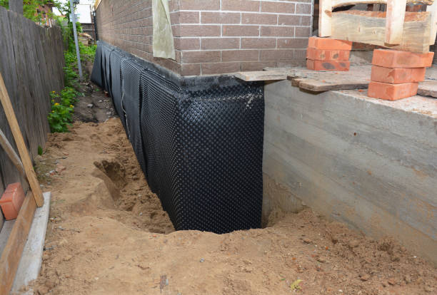 SJ Waterproofing Pros technician performing targeted Emergency Waterproofing assessment in Temple Hills, MD